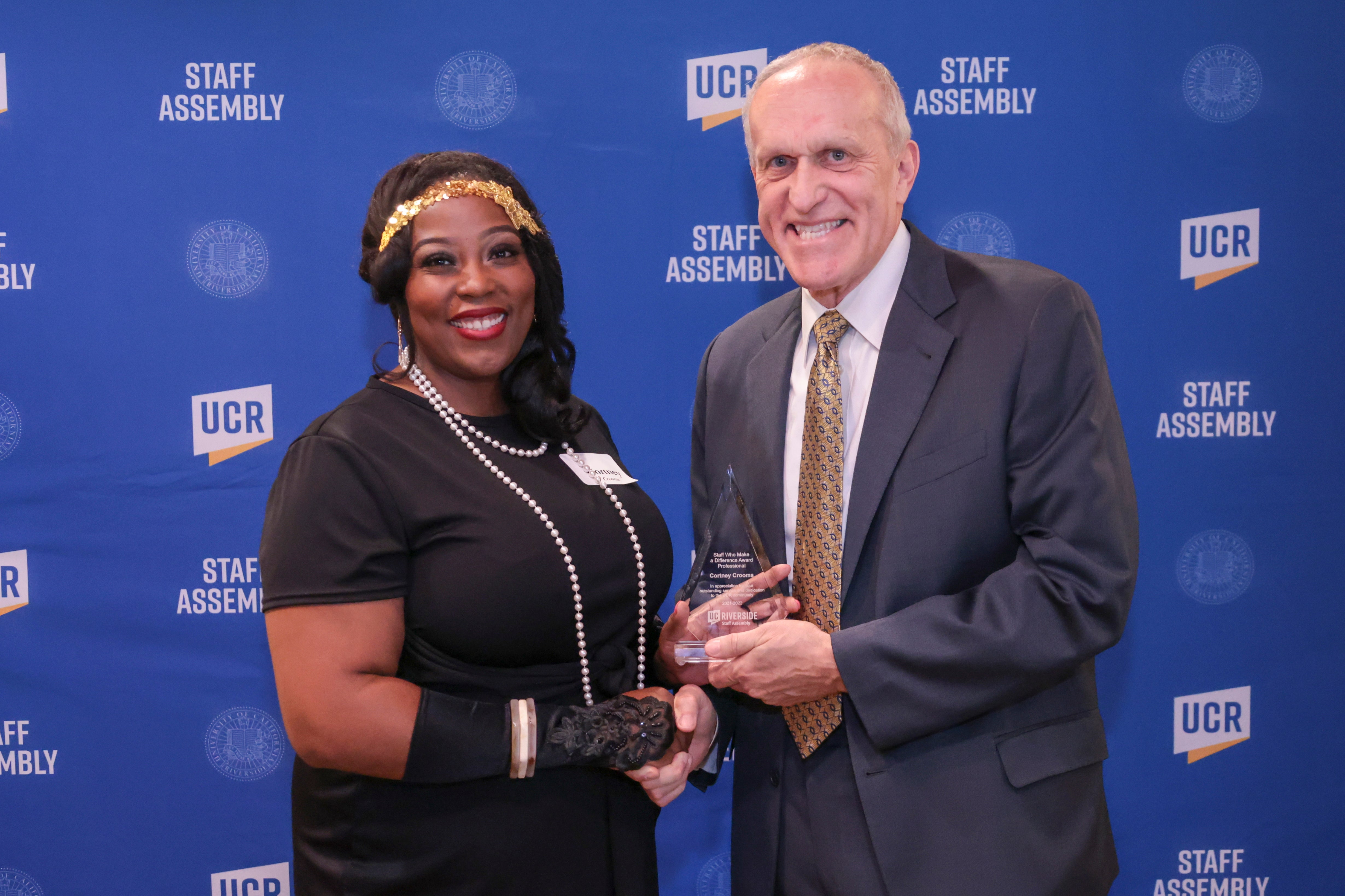 Staff Who Make a Difference award winner Cortney Crooms with Chancellor Wilcox at the 2022 Outstanding Staff Awards