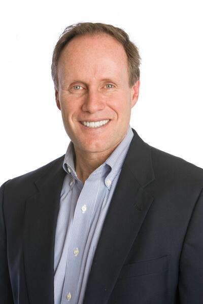 Stephen M.R. Covey headshot, a man in a suit