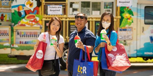 UCR employees enjoying a free Kona Ice at the 2022 Community Partner Fair