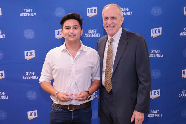 Dante Kruise and Chancellor Wilcox at the 2022 Outstanding Staff Awards