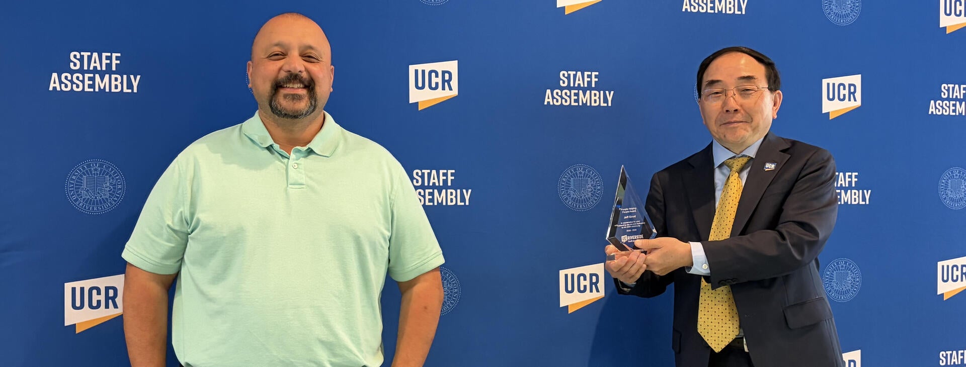 CHRO Alex Najera and Chancellor S. Jack Hu at the 2026 Outstanding Staff Awards.